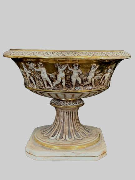 CAPODIMONTE "CHERUBS" 10" CONSOLE CENTERPIECE: This is a 20th Century Italian Capodimonte Console Centerpiece, numbered and marked as original. 10"h. x 13"w. Good condition. Does show minor wear and a little chip (see pictures)