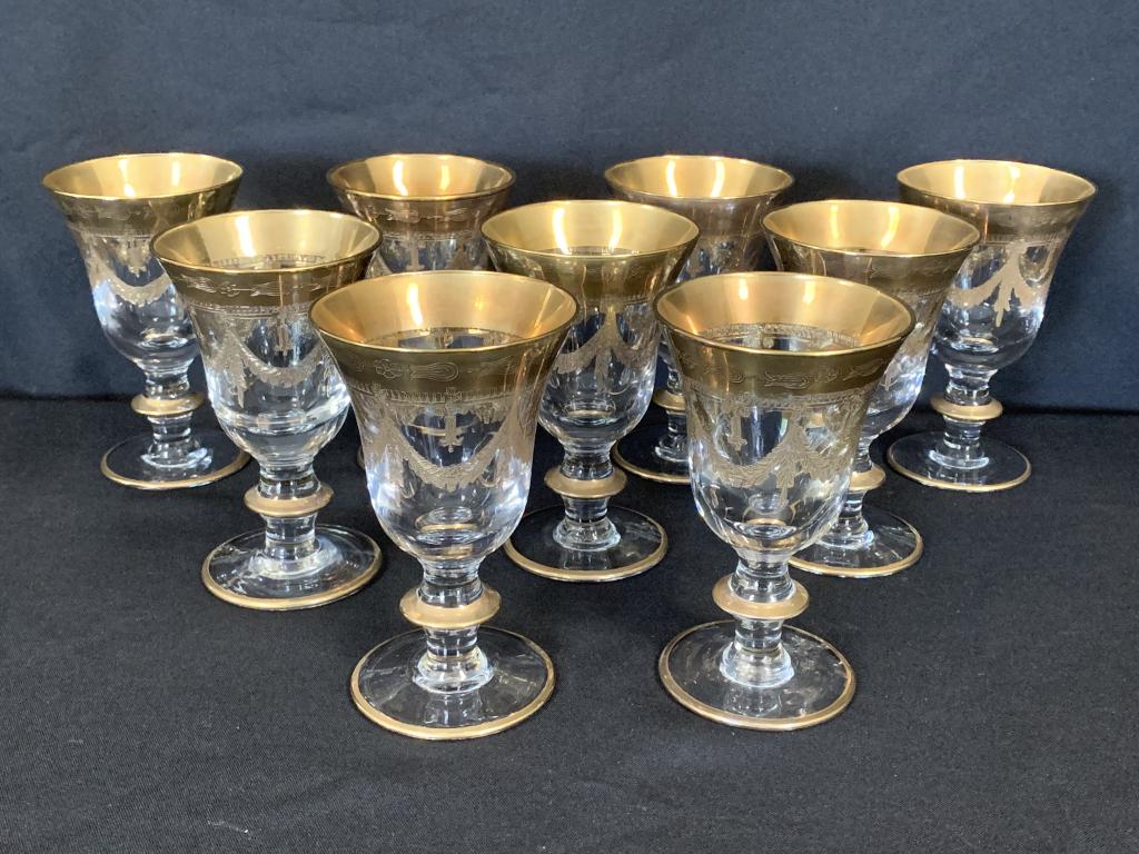 ITALIAN CRYSTAL ETCHED GOLD WHITE WINE GLASSES X 9: Italian crystal with gold rim and etchings of harps and swag detail. Amazing set of 9 white wine glasses. Very good condition with only light signs of wear to the gold. MEASUREMENTS 3.5" DIAMETER, 5.7