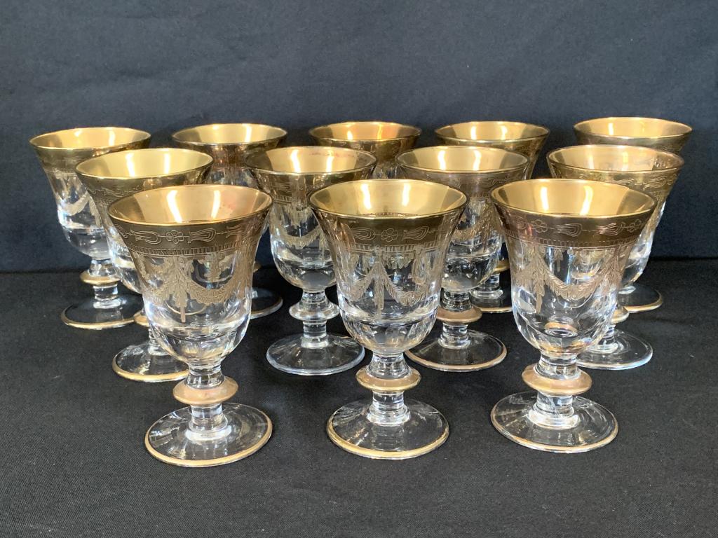 ITALIAN CRYSTAL ETCHED GOLD BURG WINE GLASSES X12: Italian crystal with gold rim and etchings of harps and swag detail. Amazing set of 12 small burgundy wine glasses. Good condition with a lot of wear to the gold on several glasses, see all pictures. 