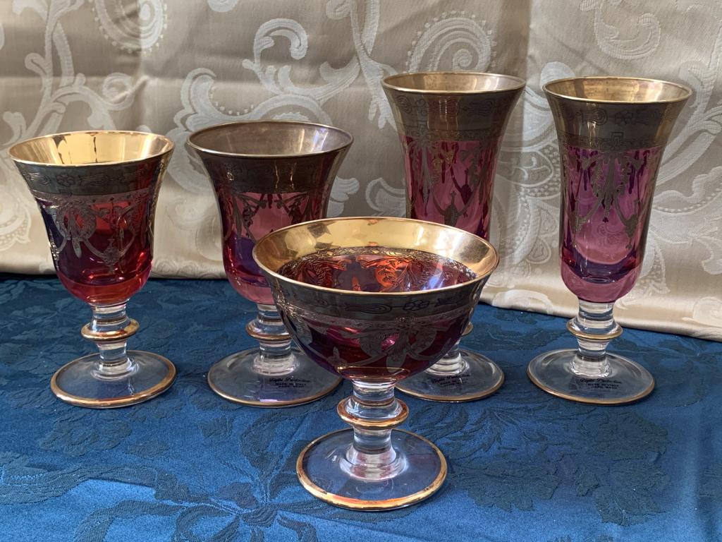 RUBY RED ITALIAN CRYSTAL GOLD SWAG GLASSES X 5: RUBY RED ITALIAN CRYSTAL GOLD SWAG GLASSES X 5 - 1 SHERBET glass 5" in height - 2 wine glasses 6" in height - 2 champagne flutes 7.25" in height - all in good condition with gentle signs of wear to th