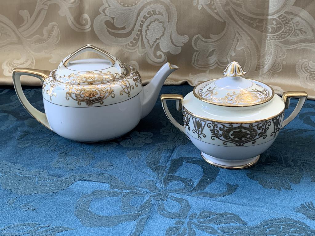NORITAKE 16034 & 175 GOLD PAINTED TEACUP & SUGAR: NORITAKE 16034 & 175 GOLD PAINTED TEACUP & SUGAR - 2 PC LOT OF NORITAKE - Teapot and creamer - Both handpainted gold designs sold together - sugar is 6" diameter and teapot is 8" diameter - GOOD condi