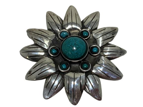 TAXCO MEXICO STERLING TURQUOISE DAISY PENDANT PIN: TAXCO MEXICO STERLING TURQUOISE DAISY PENDANT PIN - BEAUTIFUL with turquoise center and sterling petals - Includes pin fixture and pendant loop - 16.6 grams total weight - 2.25" diameter (a big one!)