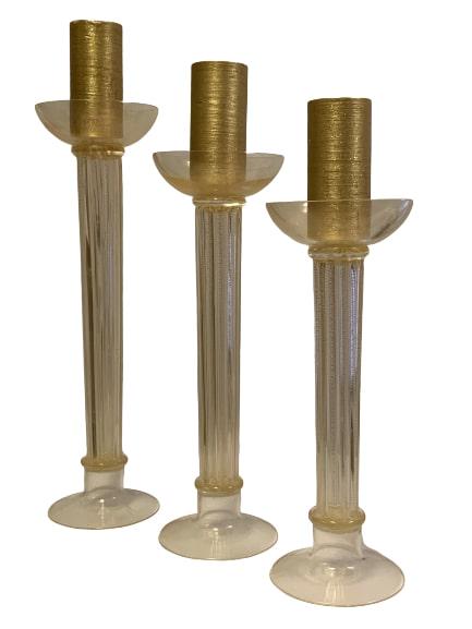 MURANO OGGETTI FLUTED GLASS CANDLE HOLDER SET (3): Elegant Murano Oggetti Italy art SET OF 3 glass candle holders. Perfect to add a beautiful touch of style for a dining room table, etc. Fluted stems and top holds a nice size candle. Dimensions 7"W ×