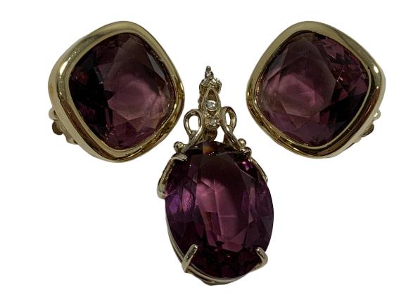 VTG AMETHYST GLASS GOLD PENDANT & CLIP ON EARRINGS: AMETHYST GLASS GOLD PENDANT & CLIP ON EARRINGS WOW - Amethyst colored glass pendant with matching earrings - Pendant has latch in place - Clip on earrings - Earrings are 1" in size - Pendant is 1.5" i