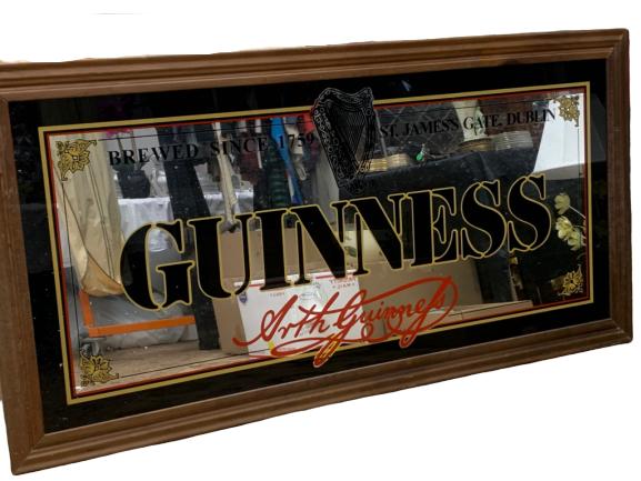 HUGE GUINNESS BEER LOGO ADVERTISING BAR MIRROR: Oversized bar decor. Guinness beer advetising logo mirror sign. Great condition, some mild wear to the wood frame. 34" tall x 65" wide in size. Third party shipping required.
