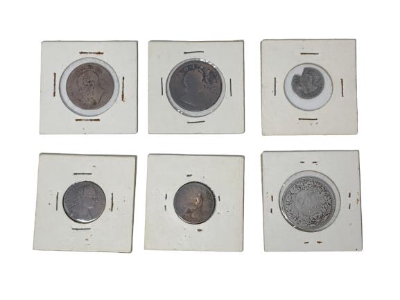 GROUPING OF OLDER FOREIGN COINS: To include: 5 cetensimo Italy 1800's, 1772 Soho Great Britan possibly half penny, 1775 George lll pence we believe, 1773 Spanish real with a pie slice removed, 1894 2 Franc, 1807 British, 1892 Canadia