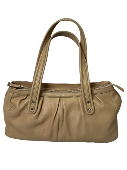 CALVIN KLEIN BROWN LEATHER HANDBAG PURSE: This is a pretty handbag by Calvin Klein. Made of leather and has a zipped pocket inside along with 2 cell phone pockets. Double handle and zippers open and close. Also comes with a shoulder strap. Me