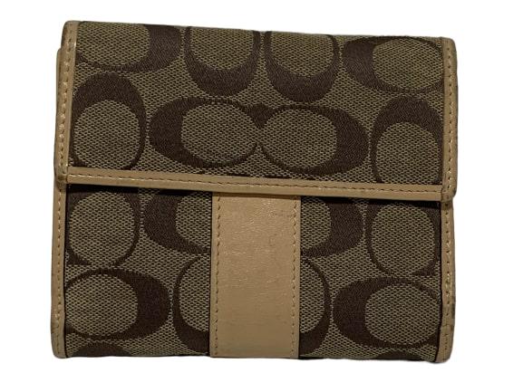 COACH CC LOGO CANVAS LEATHER TRIM FOLDING WALLET: COACH fabulously famous cc logo all over with soft brown leather trim. Good preowned condition. Measures 4" x 5" in size. Third party shipping required.