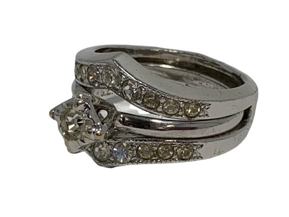 18K ELECTROPLATE GOLD CZ WEDDING RING SET 6.5: STUNNING 18k white gold electroplated with CZ solitaire ring that insets into a CZ crystal encrusted frame. Beautiful set with one stone missing as shown in pictures. - Very good condition - Size 6.5 