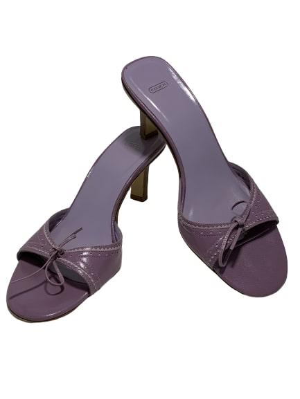COACH PURPLE LEATHER SLIDES SANDALS HEELS SZ 8.5 B: COACH designer heels that are stunning and awesome in purple. Size 8.5B on shoe. Good preowned condition as seen in pictures. Third party shipping required.