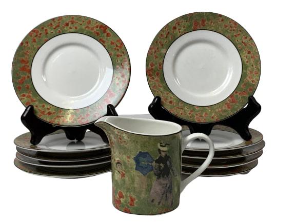 'MONET" AMERICAN ATLIER SET OF (10) DISHES/CREAMER: This is a set of 10 small dishes and a creamer by AMERICAN ATELIER. It is called MONET after the famous artist's works. The dishes have monet's flowers around trim and the creamer displays Claude Mone