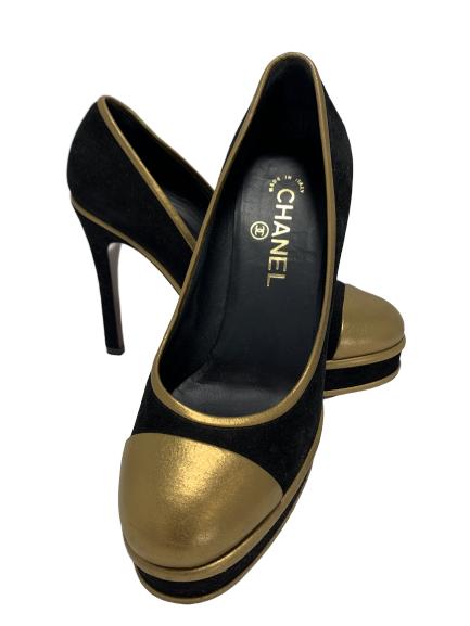 CHANEL BLACK AND GOLD PLATFORM PUMPS: BLACK AND GOLD CHANEL PLATFORM PUMPS -Size 38 -With original dust bag -Worn once! Like new!!