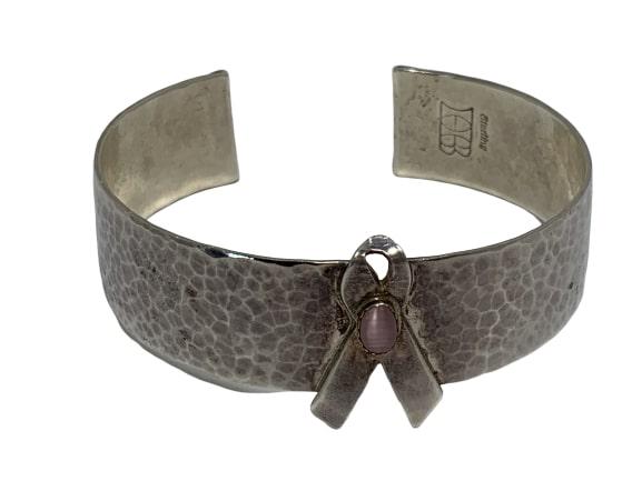 STERLING HB BREAST CANCER RIBBON CUFF BRACELET: Signed HB and STERLING on the inside. 2.25" diameter on the bracelet will fit a 7" wrist nicely. 30 grams total weight. Third party shipping required.