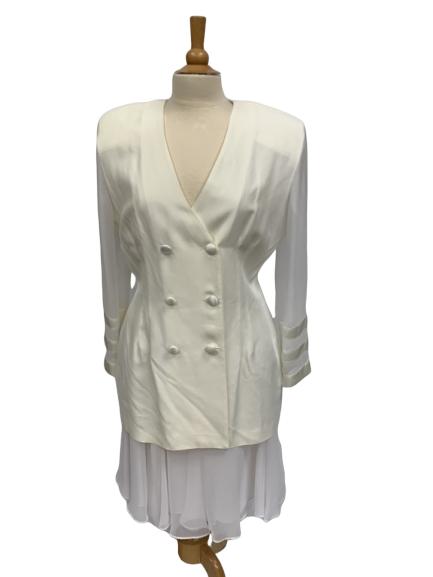 JOSEPH RIBKOFF SHEER GEORGETTE TRIM SKIRT JACKET L: JOSEPH RIBKOFF WOMAN'S JACKET AND SKIRT Jacket is made of 60% Rayon / 40% Acetate Skirt is 100% Polyester. Jacket will fit a 40" bust and skirt is stretchy so fits medium to large. Large sized overall
