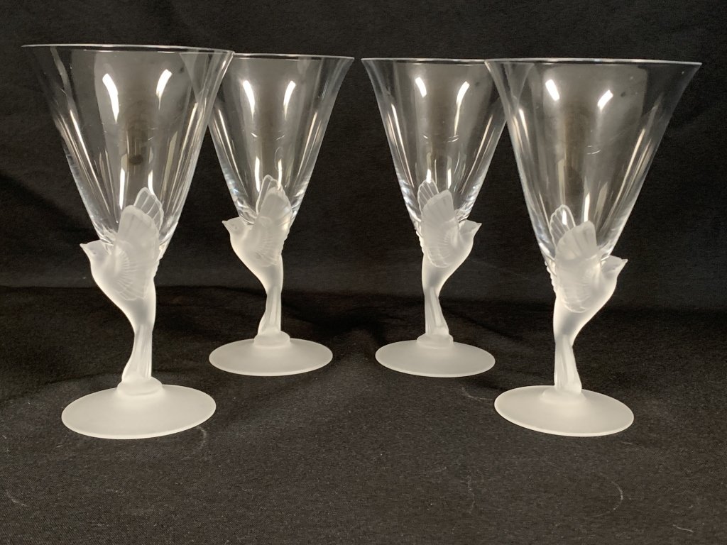 4 FROSTED BIRD WATER GLASSES LALIQUE INSPIRED: 4 FROSTED BIRD WATER GLASSES LALIQUE INSPIRED Description: Clear, Frosted Bird Stem Pattern: Wings Clear by Sasaki Status: Discontinued. Circa: 1975 - 2005 Height: 7 5/8 in