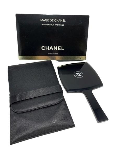 NEW CHANEL 9" CC LOGO BLACK HAND MIRROR W/BLK CASE: NEW IN BOX and never used, a great gift to buy for someone! Hand held mirror in classic black with CC LOGO on back side. Comes with smooth nylon carrying case for protection. Perfect new condition. Me