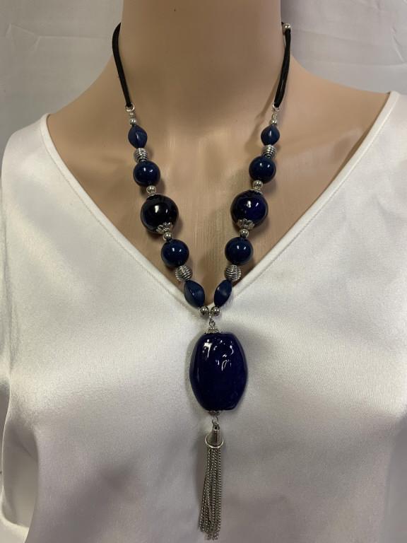 VINTAGE BLUE BEADS AND TASSEL NECKLACE: VINTAGE BLUE BEADS AND TASSEL NECKLACE -15" LONG ADJUSTABLE-LEATHER STRING CLOSURE