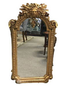 SPANISH GOLD GILT WOOD ART DECO MIRROR 38": SPANISH GOLD GILT CARVED WOOD ART DECO MIRROR-38" X 21" X 2"-VERY GOOD CONDITION, SLIGHT DISCOLORATION ON BOTTOM LEFT CONSISTENT WITH AGE