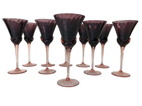 10 VINTAGE PLUM COLOR STEMWARE GLASSES 9": 10 VINTAGE PLUM COLOR SOPHISTACATED STEMWARE MARTINI, WINE, COCKTAIL GLASSES BARWARE 9" X 4" APPROX EACH -VERY GOOD CONDITION, ONE SMALL CHIP TO EDGE OF ONE GLASS