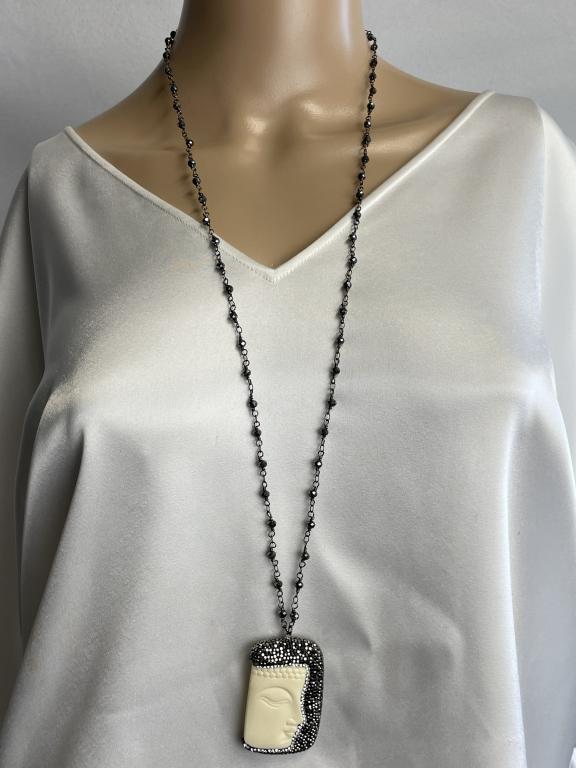 LONG BEADED NECKLACE WITH MARCASITE PENDANT: LONG BEADED NECKLACE WITH MARCASITE PENDANT-A LONG BEADED STRAND WITH AN ASIAN PENDANT ENCRUSTED WITH MARCASITES ON BOTH SIDES.-NECKLACE LENGTH 33"-PENDANT 2" X 1.5"-VERY GOOD CONDITION-TK111720