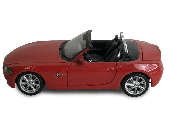 BMW 2.5i SCALE MODEL REPLICA CAR: BMW 2.5i SCALE MODEL REPLICA CAR LUXURY AUTOMOBILE RED CONVERTIBLE GERMAN SPORTS CAR -3"X 8" X 3" APPROX -VERY GOOD CONDITION, SOME MARKS -DP12820