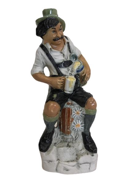 VINTAGE CAPODIMONTE STYLE DECANTER 11.5": VINTAGE CAPODIMONTE STYLE DECANTER (BARWEAR CLASSIC COCKTAILS BAR DECOR GERMAN OKTOBERFEST FIGURINE) -11.5" X 4.5" X 3" APPROX -VERY GOOD VINTAGE CONDITION -THIS LOT IS SOLD FOR THE DECANTER ONLY, WE