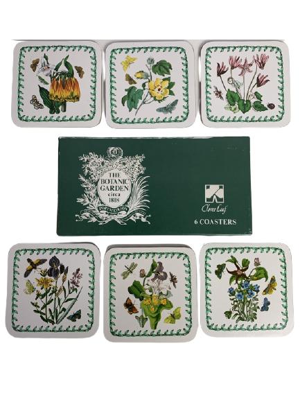 VTG 6 CLOVER LEAF "THE BOTANIC GARDEN" COASTERS: VTG 6 CLOVER LEAF "THE BOTANIC GARDEN" COASTERS -IN ORIGINAL BOX-"THE BOTANIC GARDEN CIRCA 1818" DESIGNED BY SUSAN WILLAMS-ELLIS-SET OF 6 CORKBACK COASTERS-VERY GOOD CONDITION-4.1" x 4.1"-CC1721