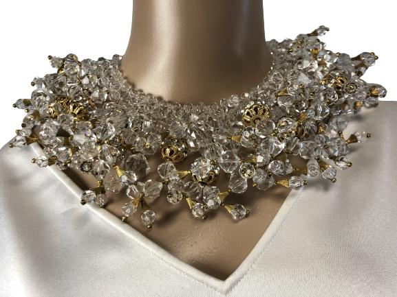 VTG CHOKER W/CLEAR BEADS AND GOLD STATIONS 9": VTG CHOKER W/CLEAR BEADS AND GOLD STATIONS 9" - CLEAR BEADS ON COLLAR W/BEADS AND GOLD HANGING STRANDS- VERY GLAMOUROUS PIECE- BEADED HOOK CLOSURE- GOOD VINTAGE CONDITIONBC