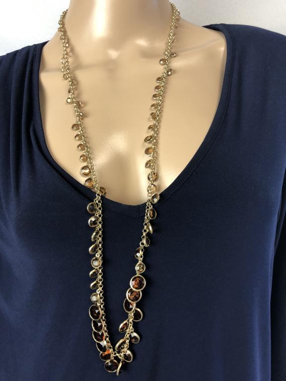 VTG CHICO'S LARIAT-STYLE NECKLACE W/ AMBER STONES: VTG CHICO'S LARIAT-STYLE NECKLACE W/ AMBER RHINESTONES - VINTAGE LONG LARIAT STYLE NECKLACE- ACCENTED WITH CLEAR AND AMBER COLORED RHINESTONES- LOBSTER CLASP- SIGNED "CHICO'S"- VERY GOOD VINTAGE CONDI