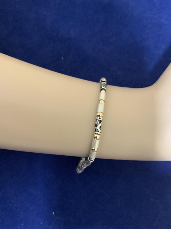 STERLING SILVER AND GOLD BEAD BRACELET: STERLING SILVER AND GOLD BEAD BRACELET --MATCH TO NECKLACE IN LOT 455