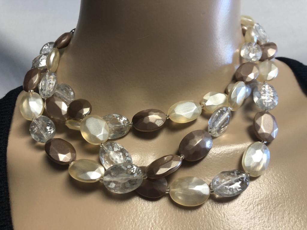TRIPLE-STRAND CHOKER WITH BEIGE & CLEAR BEADS 9": TRIPLE-STRAND CHOKER WITH BEIGE & CLEAR BEADS 9" - SHADES OF BEIGE BEADS; CLEAR BEADS ARE DISTRESSED LOOKING - ADJUSTABLE CLOSURE