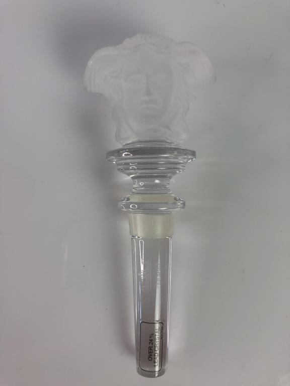 VTG VERSACE MEDUSA FROSTED CRYSTAL BOTTLE STOPPER: VTG VERSACE MEDUSA FROSTED CRYSTAL BOTTLE STOPPER- 5"- PART OF "MEDUSA LUMIERE" COLLECTION- FROSTED MEDUSA HEAD ON BOTH SIDES OF STOPPER- MADE IN AUSTRIA- VERY GOOD VINTAGE CONDITION