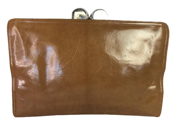 VTG BOTTEGA VENETA OVERSIZE LEATHER CLUTCH 12": VTG BOTTEGA VENETA OVERSIZE LEATHER CLUTCH 12" - 12" X 8" X 1"- SADDLE COLORED DISTRESSED LEATHER- SILVER CLOSURE-ONE INTERIOR ZIPPERED POCKET- PEN MARKS ON BAG (SEE PHOTO)- GOOD VINTAGE CONDITION