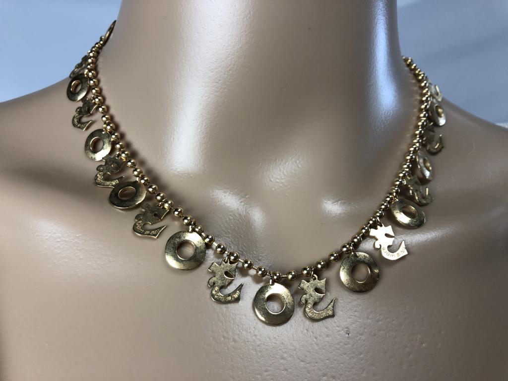 VINTAGE OM MANI GOLDTIBETAN MANTRA NECKLACE 16": VINTAGE OM MANI GOLDTIBETAN MANTRA NECKLACE 16" LUXURY COSTUME JEWELRY JEWELS GOLD SILVER GOLD BEADED CHOKER WITH MANTRA & VADRA CHARMSSYMBOLS ARE PROMINENT IN YOGA AND HEALINGVERY GOOD VINTAGE CONDIT