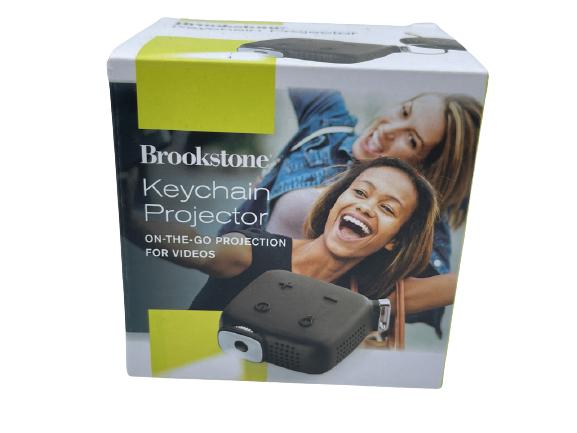 BROOKSTONE KEYCHAIN PROJECTOR: BROOKSTONE KEYCHAIN PROJECTOR -NEW IN BOX