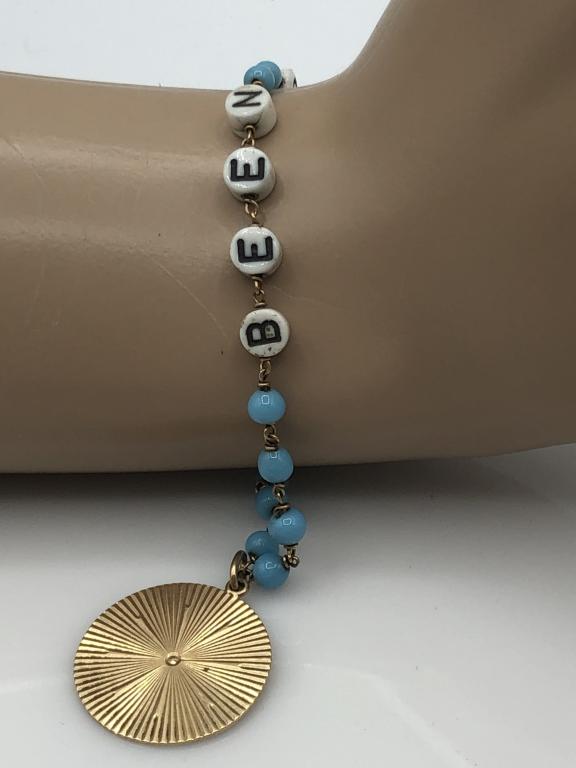 VINTAGE NAME BRACELET WITH GOLD PENDANT 7": - WHITE LETTER BEADS SPELL "BEEN C"- TURQUOISE BEADS- 14K GOLD STARBURST PENDANT WITH "SUSAN 10-31-44" INSCRIPTION- PENDANT IS APPROXIMATELY 4 GRAMS- GOOD VINTAGE CONDITIONLuxury women's jewelry, ladi