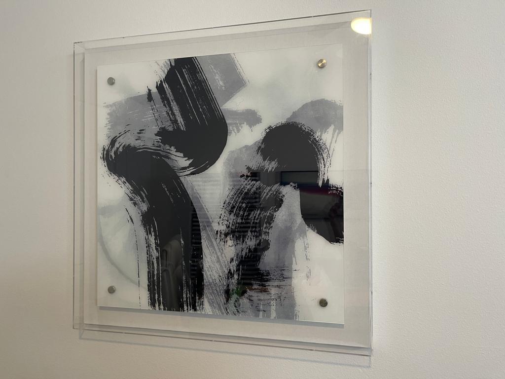 MODERN ABSTRACT ART IN LUCITE FRAME (1 of 3)