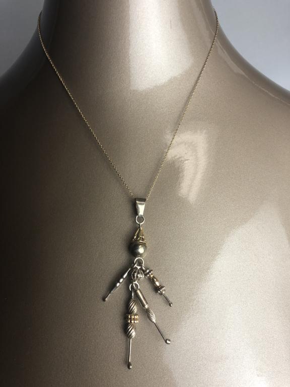 MOVEABLE MAN CHARM SILVER AND GOLD WITH CHAIN (1 of 3)