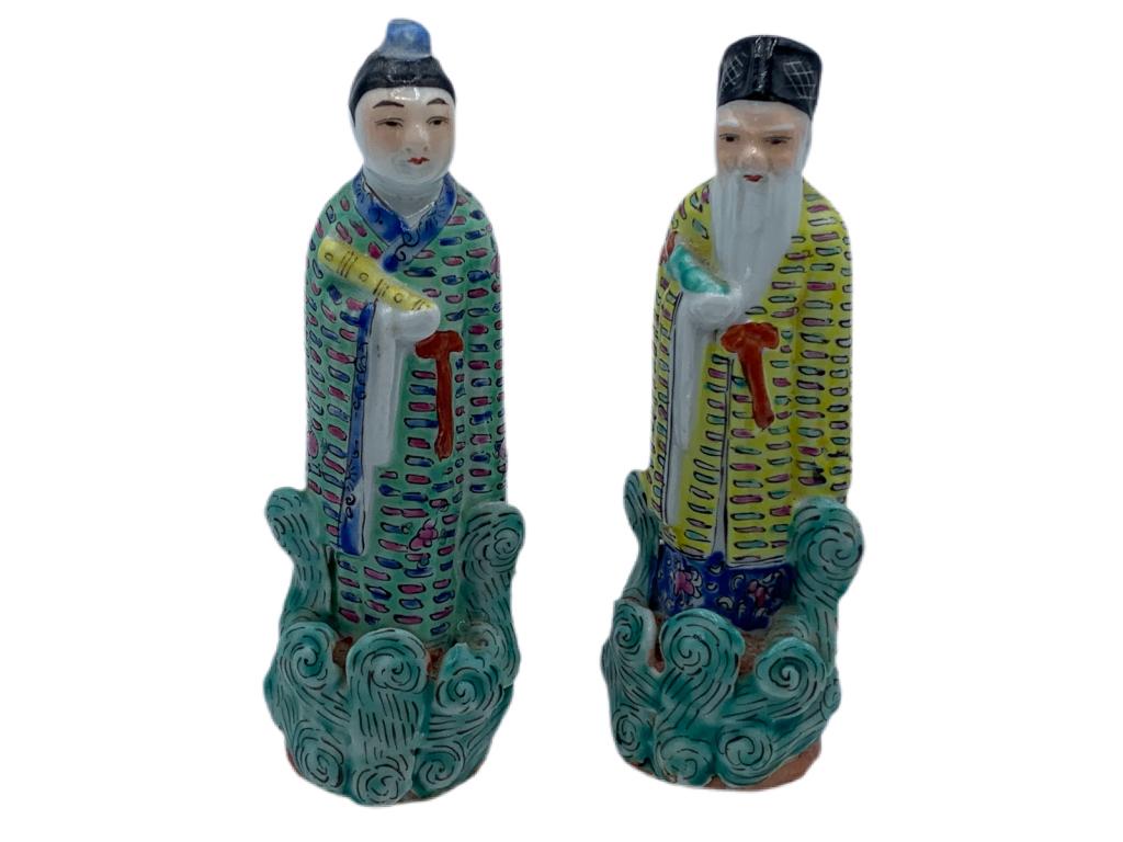PAIR OF VINTAGE ORIENTAL FIGURINES (1 of 3)