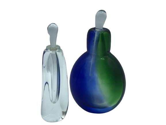 PAIR OF VINTAGE GLASS PERFUME BOTTLES: PAIR OF VINTAGE GLASS PERFUME BOTTLES - ONE IS GREEN & BLUE GLASS WITH CLEAR STOPPER 5.5" HIGH- ONE IS CLEAR GLASS WITH STOPPER 4.75" HIGH - PLEASE NOTE THE STOPPER IS STUCK INSIDE