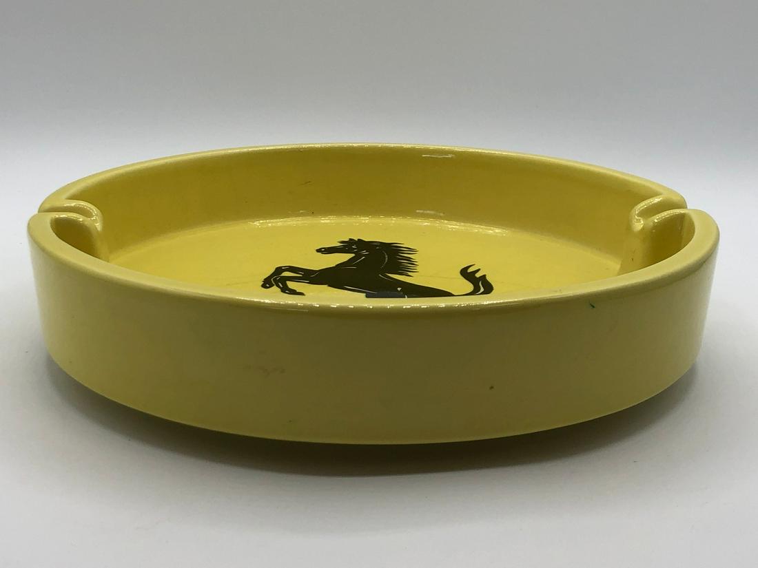 VTG FERRARI YELLOW CERAMIC CIGAR ASHTRAY 9.5": VTG FERRARI YELLOW CERAMIC CIGAR ASHTRAY 9.5" - MADE BY BITOSSI OF ITALY- GOOD VINTAGE CONDITION WITH SOME CRAZING IN THE CERAMIC AND TINY CHIPSCOLLECTIBLE CHINA, GLASS & PORCELAIN; LUXURY HOME DECOR;