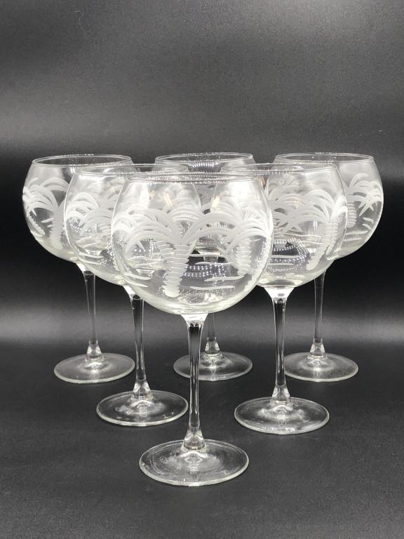 SET/6 VINTAGE PALM TREE BALLOON WINE GOBLETS 8": SET/6 VINTAGE PALM TREE BALLOON WINE GOBLETS 8" - 8" HIGH X 3.5" DIAMETER- ENGRAVED FROSTED PALM TREES- GOOD VINTAGE CONDITION - NO CHIPS OR CRACKSCOLLECTIBLE GLASSWARE & BARWARE; DINING & DRINKING; E