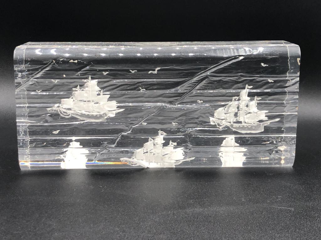 VINTAGE LUCITE ENGRAVED SHIPS ON WATER SCENE 9": VINTAGE LUCITE ENGRAVED SHIPS ON WATER SCENE 9" - 9" LONG X 2.25" X 4" HIGH- SOME SCRATCHES IN LUCITE BUT OTHERWISE IN GOOD VINTAGE CONDITIONCOLLECTIBLE HOME DECOR; BOATS AND BOATING; SHIPS; MARITIME 
