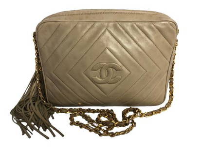 CHANEL SHOULDER CAMERA TASSEL BEIGE BAG: CHANEL SHOULDER CAMERA TASSEL BEIGE BAG - Diamond Quiltd Leather- Chain Interlaced with Beige Leather Strap, Gold Hardware- 8.7"L 6.3"H 2.2 "W- Very Good Condition- AAN4095