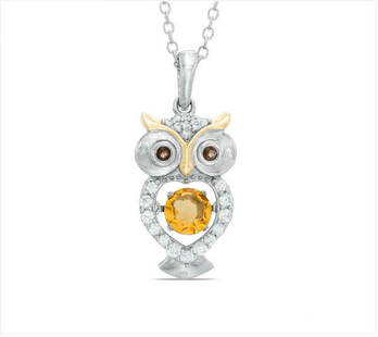 STERLING SILVER SAPPHIRE CITRINE OWL PENDANT: Fashioned in sterling silver and 14K gold plate, this owl is outlined with shimmering lab-created white sapphires and rich smoky quartz eyes. 5.0mm golden yellow citrine glistens in a unique setting.