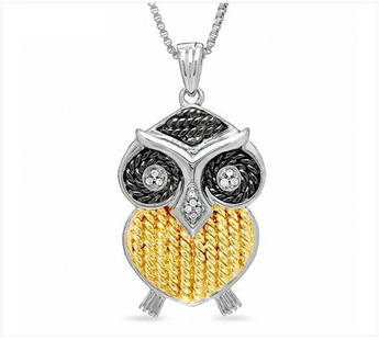 DIAMOND ACCENT STERLING SILVER OWL PENDANT: Tri-tone sterling silver and glittering diamond accents. Deep black and gold-rhodium sterling silver.-Brand new in box.