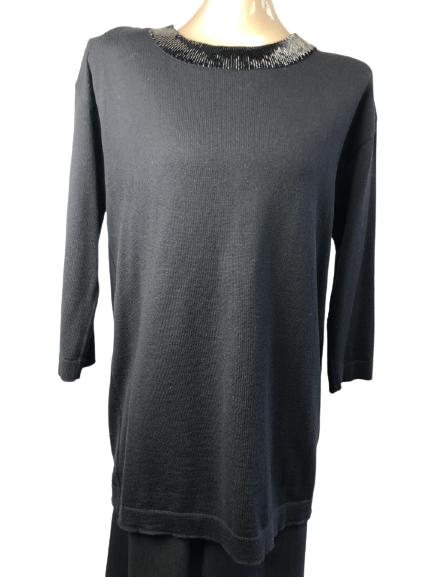 VTG ESCADA BLACK BEADED EVENING SWEATER SIZE 38: VTG ESCADA BLACK KNIT BEADED EVENING SWEATER SIZE 38 - FRONT HAS BUGLE BEADS AROUND NECKLINE- BACK HAS CUT OUT TRIANGLE WITH ALL AROUND BEADING- REMOVEABLE SHOULDER PADS- VERY GOOD CONDITION