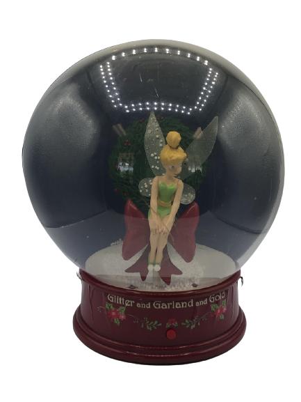 VTG DISNEY'S TINKERBELL MUSICAL SNOW GLOBE: VTG DISNEY'S TINKERBELL MUSICAL SNOW GLOBE - 12" HIGH X 7" WIDE- GEMMY MUSICAL GLITTER AND GARLAND AND GOLD- BATTERY OPERATED BUT NOT TESTED- MADE OF PLASTIC- SOME OF THE DECAL HAS STARTED TO PEEL. CO