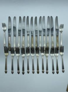 VINTAGE NATIONAL STERLING SILVER SET 1818G: VINTAGE NATIONAL STERLING SILVER SET-12 KNIVES-2 SALAD FORKS-12 DINNER FORKS-1818 GRAMS WEIGHED WITH KNIVES-GOOD CONDITION WEAR CONSISTENT WITH AGE, AND LIGHT USE-DP11022