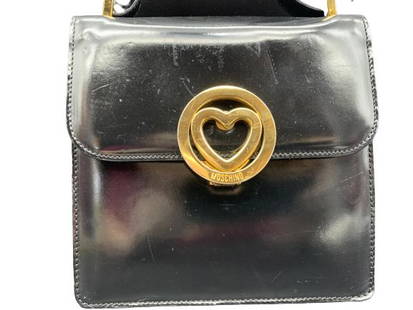 VTG MOSCHINO BLACK LEATHER HANDBAG: VTG MOSCHINO BLACK LEATHER HANDBAG-GOLD TONE HEART CLOSURE-7" X 7" X 2.5"-VERY GOOD CONDITION W/ LIGHT SIGNS OF USE-JF3/1